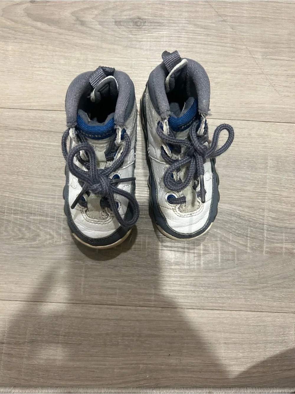 Jordan Kids White and Gray Retro Sneaker with Blue Eyelets